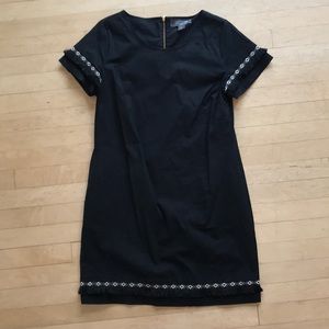 Coercion black dress